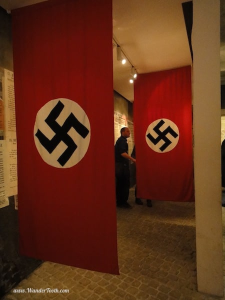 "Nazi flags on display at the Schindler Factory"