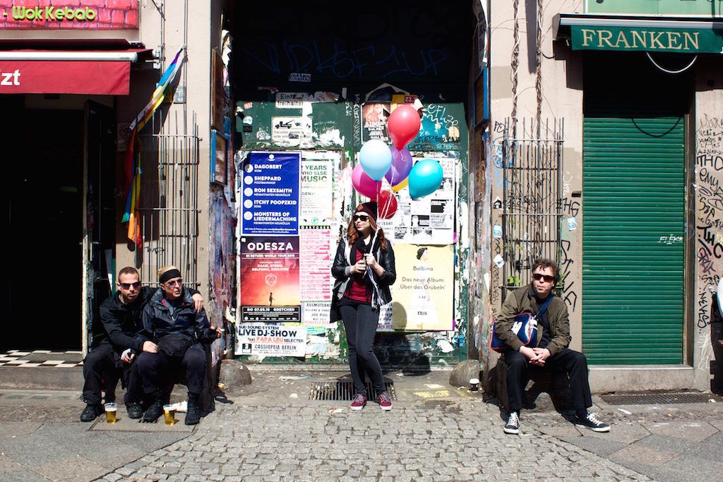 A woman stands with balloons in Berlin