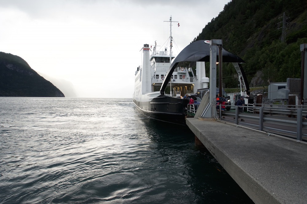 Boarding a car ferry to Geirangerfjord during Norway in one week itinerary