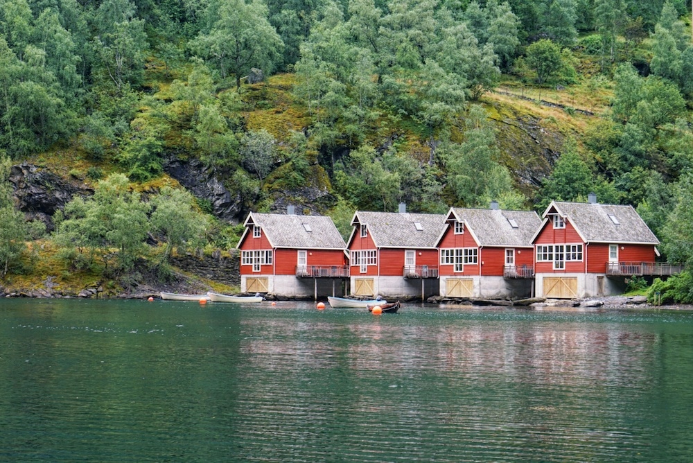 Bright red buildings on a Fjord in Norway