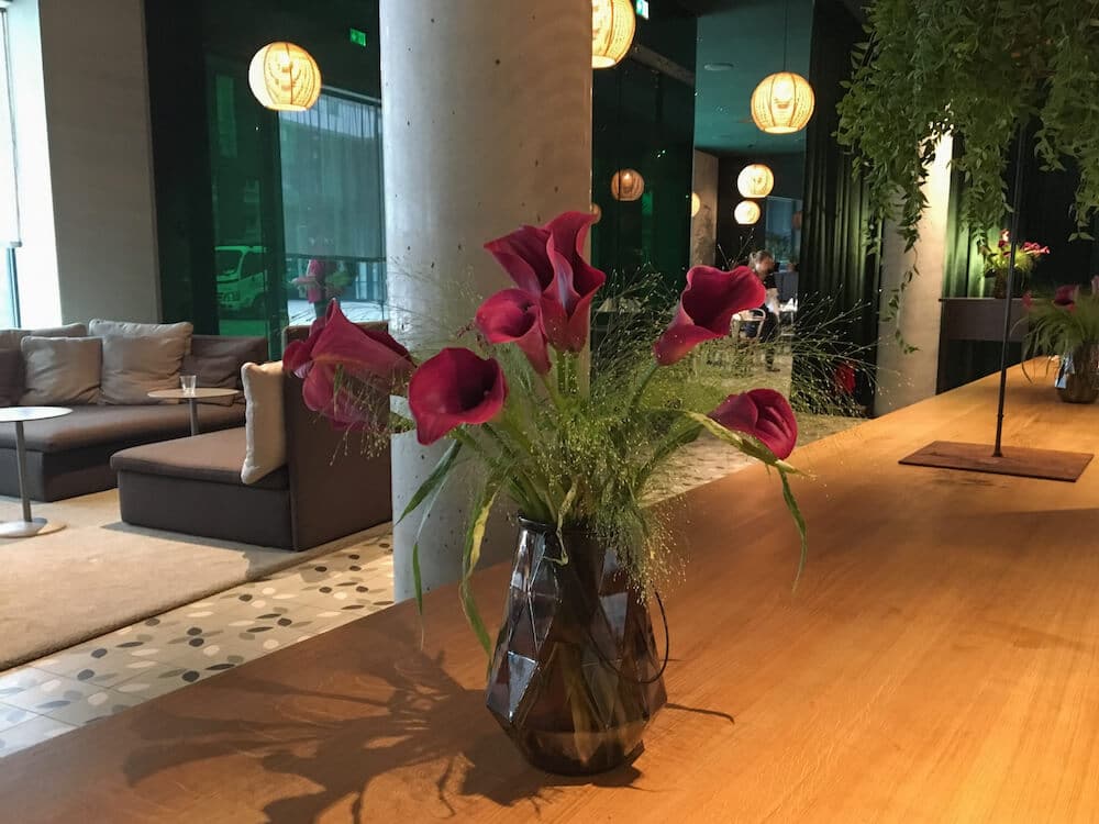 Bar in the Zander K Hotel Bergen Lobby Area Flowers