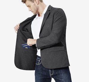 lightweight jeans for travel with a travel blazer