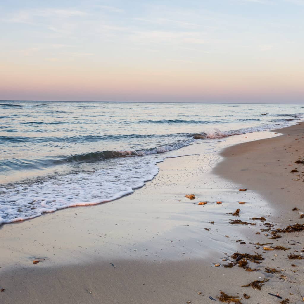 beach at canne bianchi in torre canne, italy