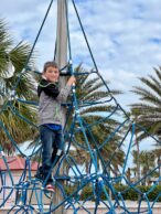 my son climbing on the playground at pier 60 in clearwater
