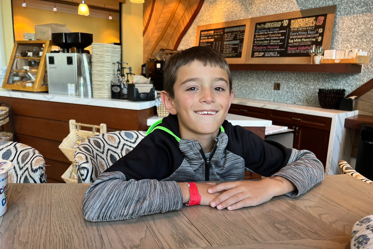 my son eating breakfast at the marketplace in sandpearl