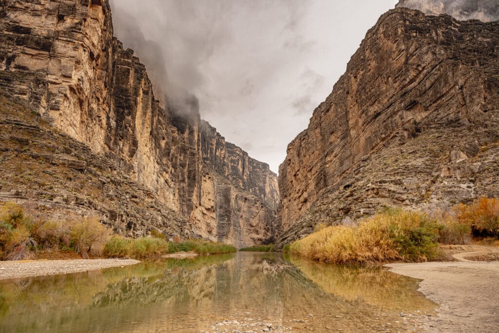 Rio Grande water reflects the walls of Santa Elena Canyon in Big Bend National Park