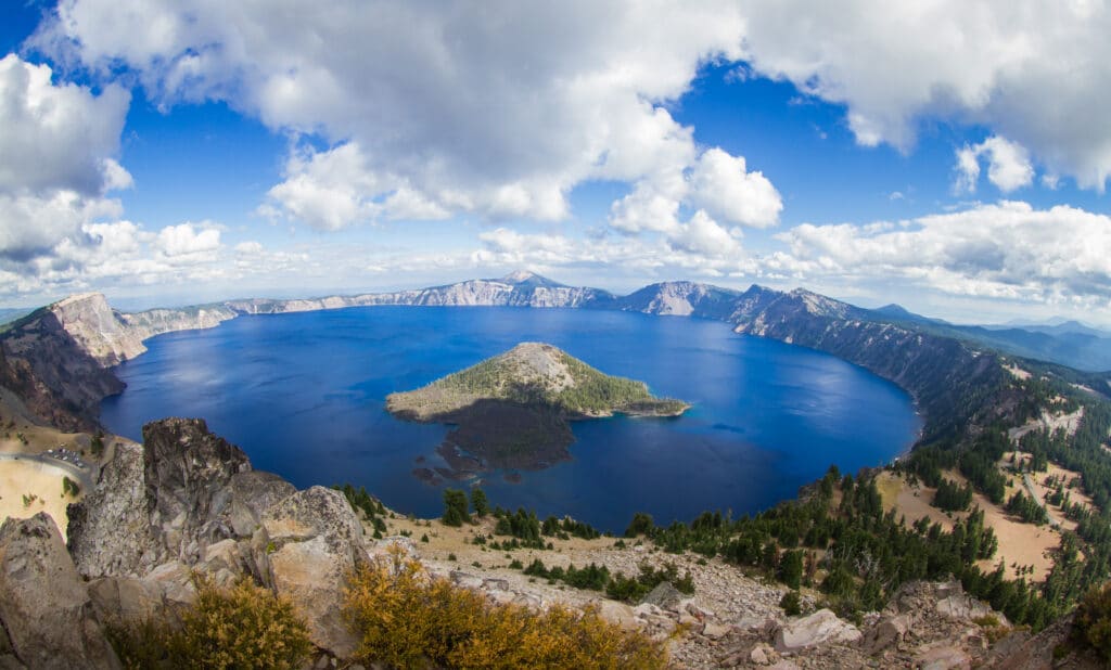 wide angle view of Crater Lake in crater lake national park from the top of Watchman's Peak