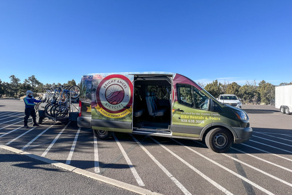 Shuttle van driving bikes to Hermit Road in Grand Canyon