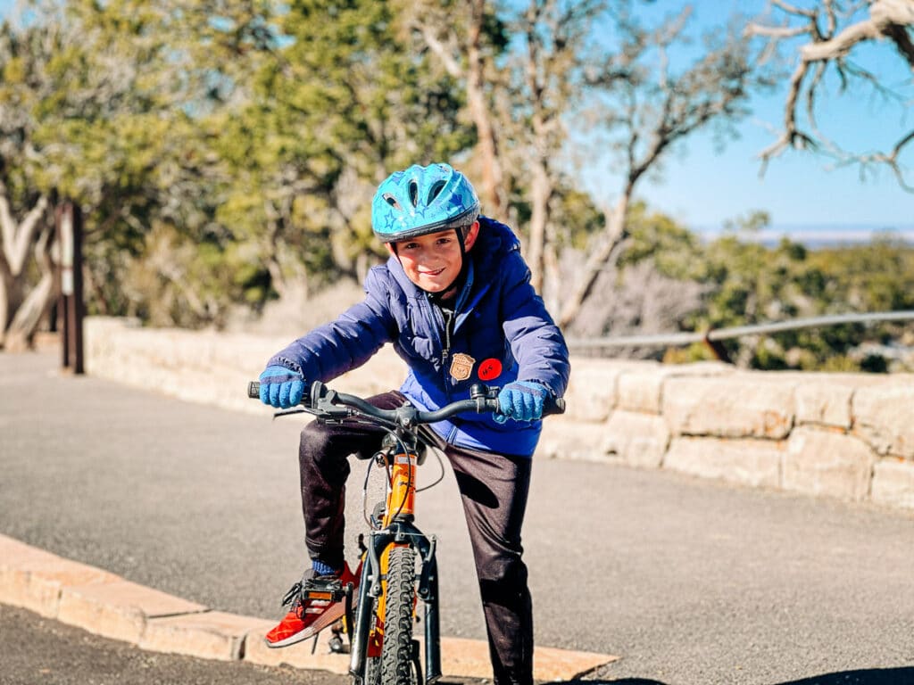 kid on bike tour at Grand Canyon