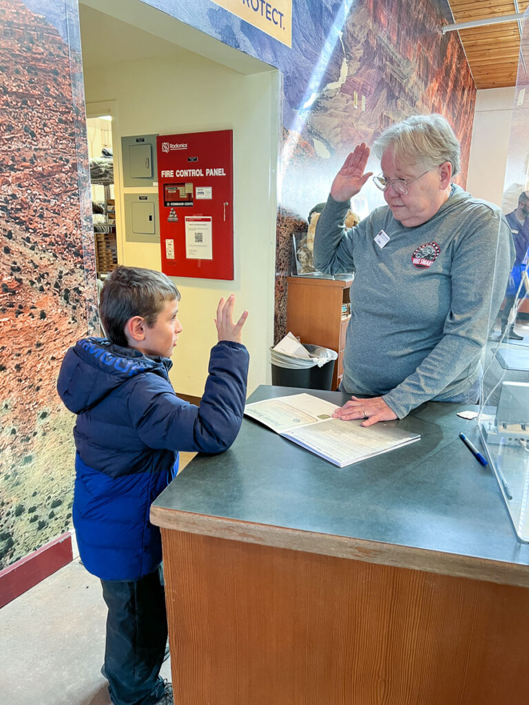 child getting sworn in as a Junior Ranger