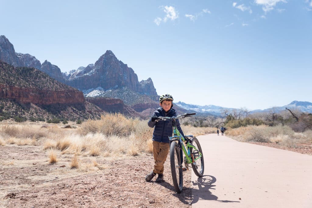 boy biking on Pa'Rus Trail in Zion National Park