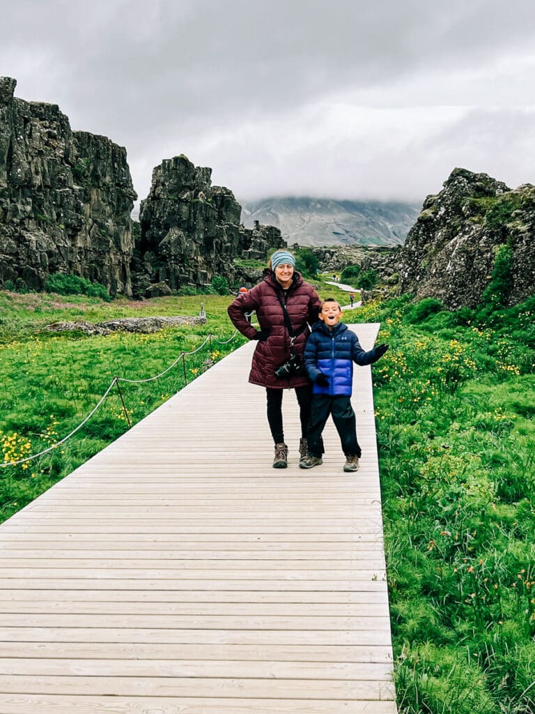 Me and my son walking to the waterfall at Thingvellir National Park