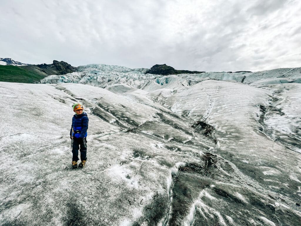 my son on a glacier hike