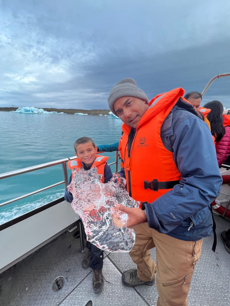 holding an ice chunk on the amphibian boat tour