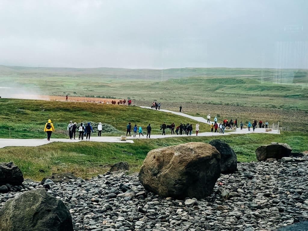 tourists walking to view Gullfoss Waterfall