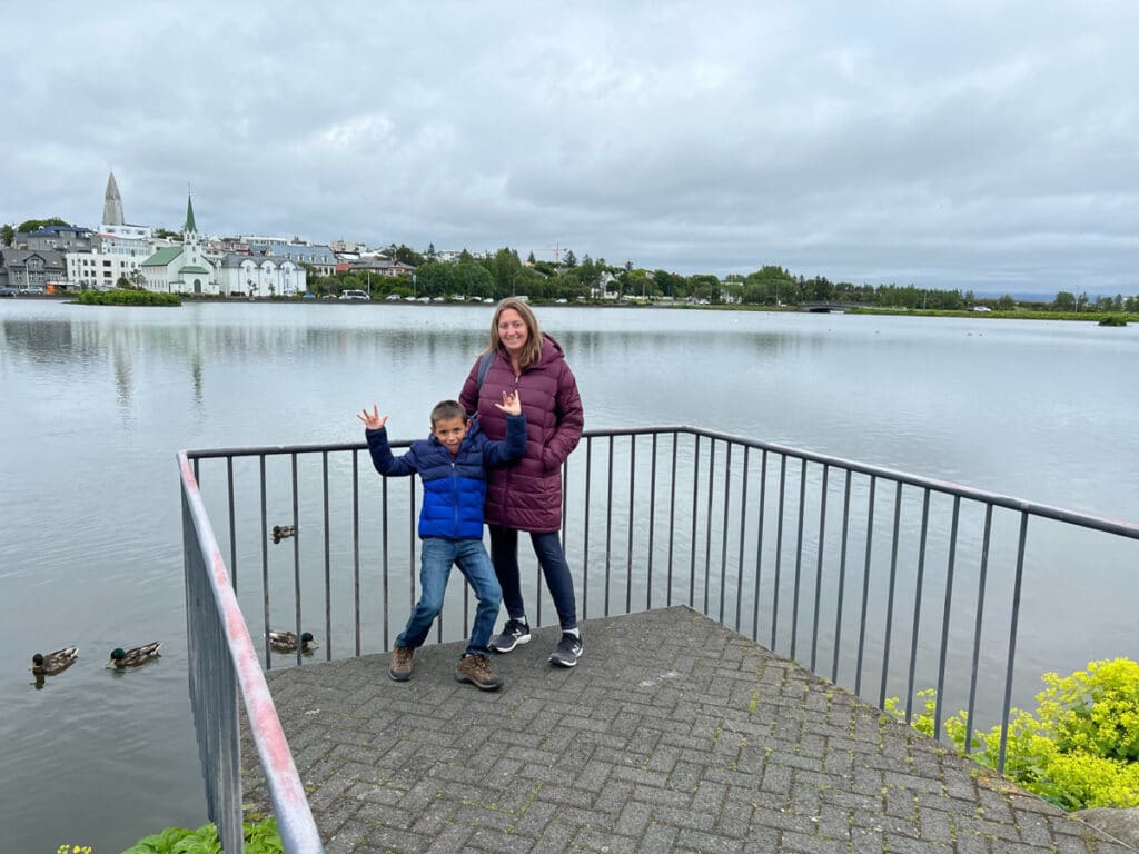 me and my son at Lake Tjornin in Reykjavik, Iceland