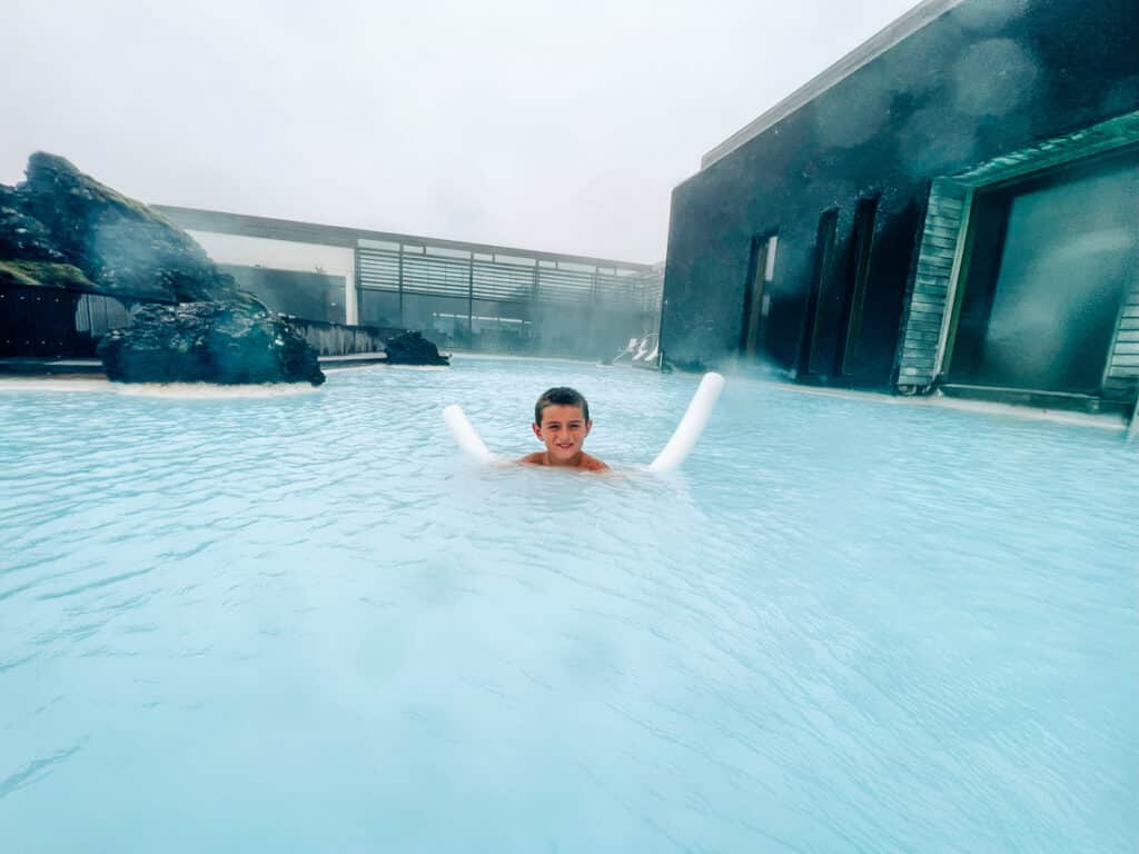 My son swimming in the private Lagoon at Silica Hotel in Iceland