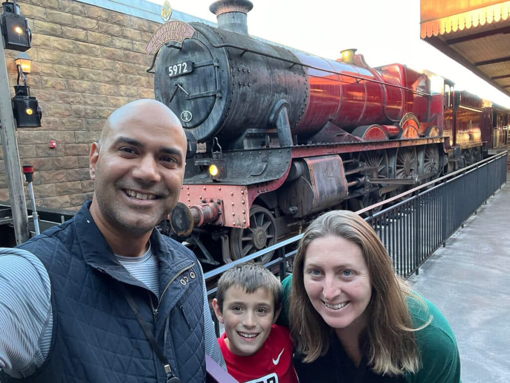 My family in front of the Harry Potter train at Universal Studios.