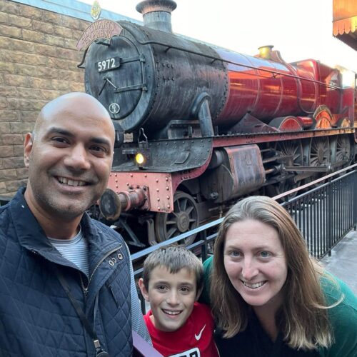 My family in front of the Harry Potter train at Universal Studios.