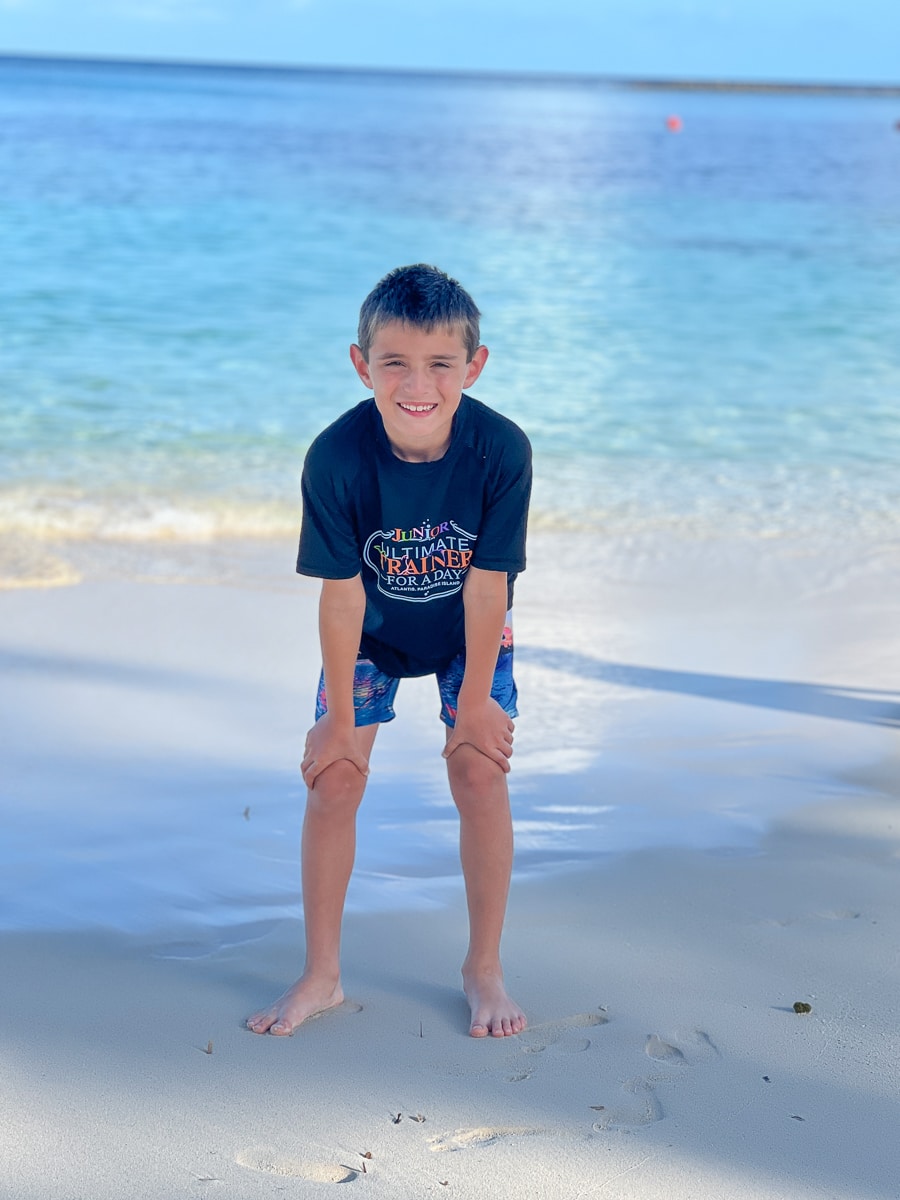 my son on the beach at Atlantis Resort in the Bahamas