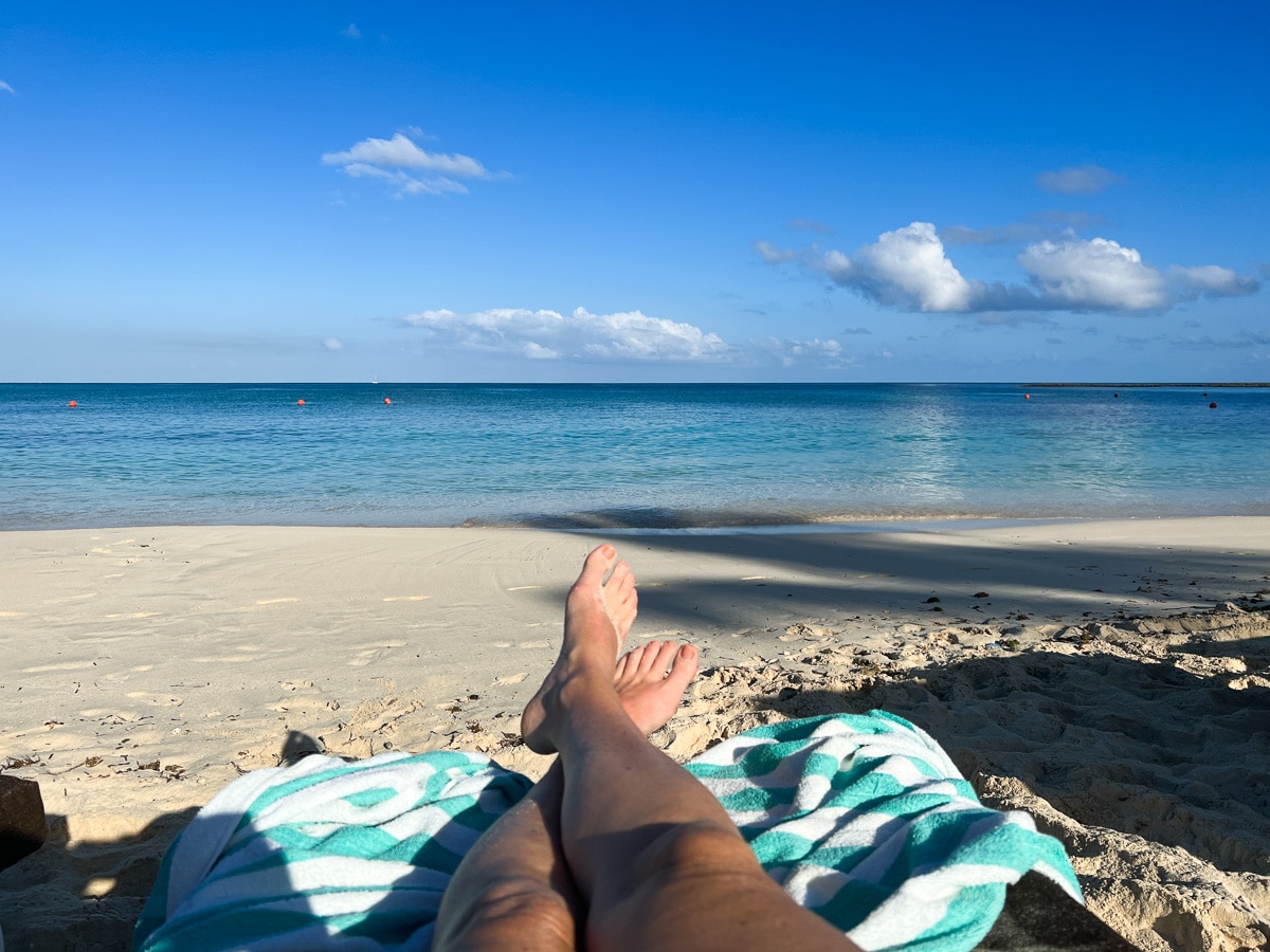 me laying on the beach at Atlantis