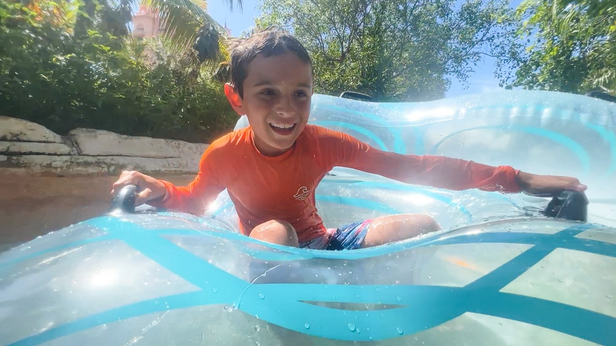 my son on the Rapid River at Atlantis Aquaventure