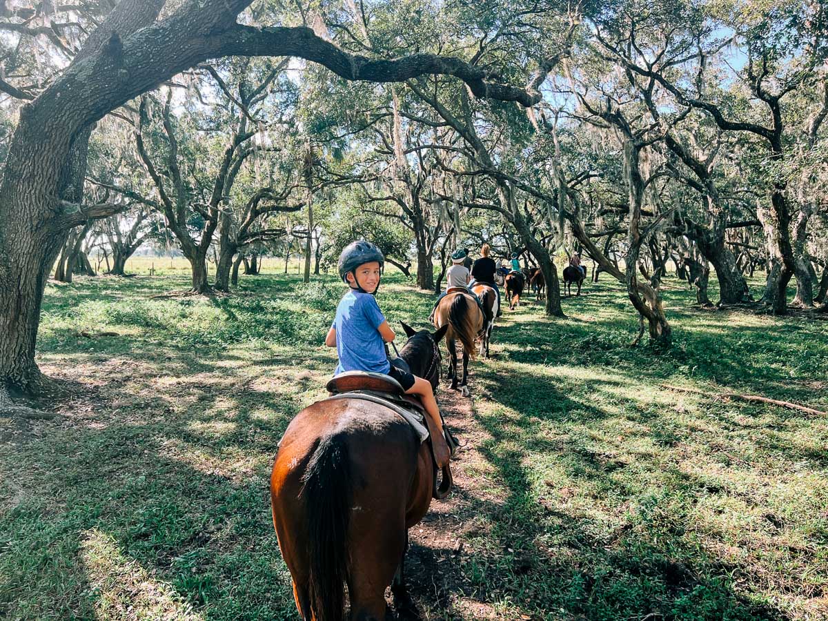 my son on a horseback ride at Westgate River Ranch
