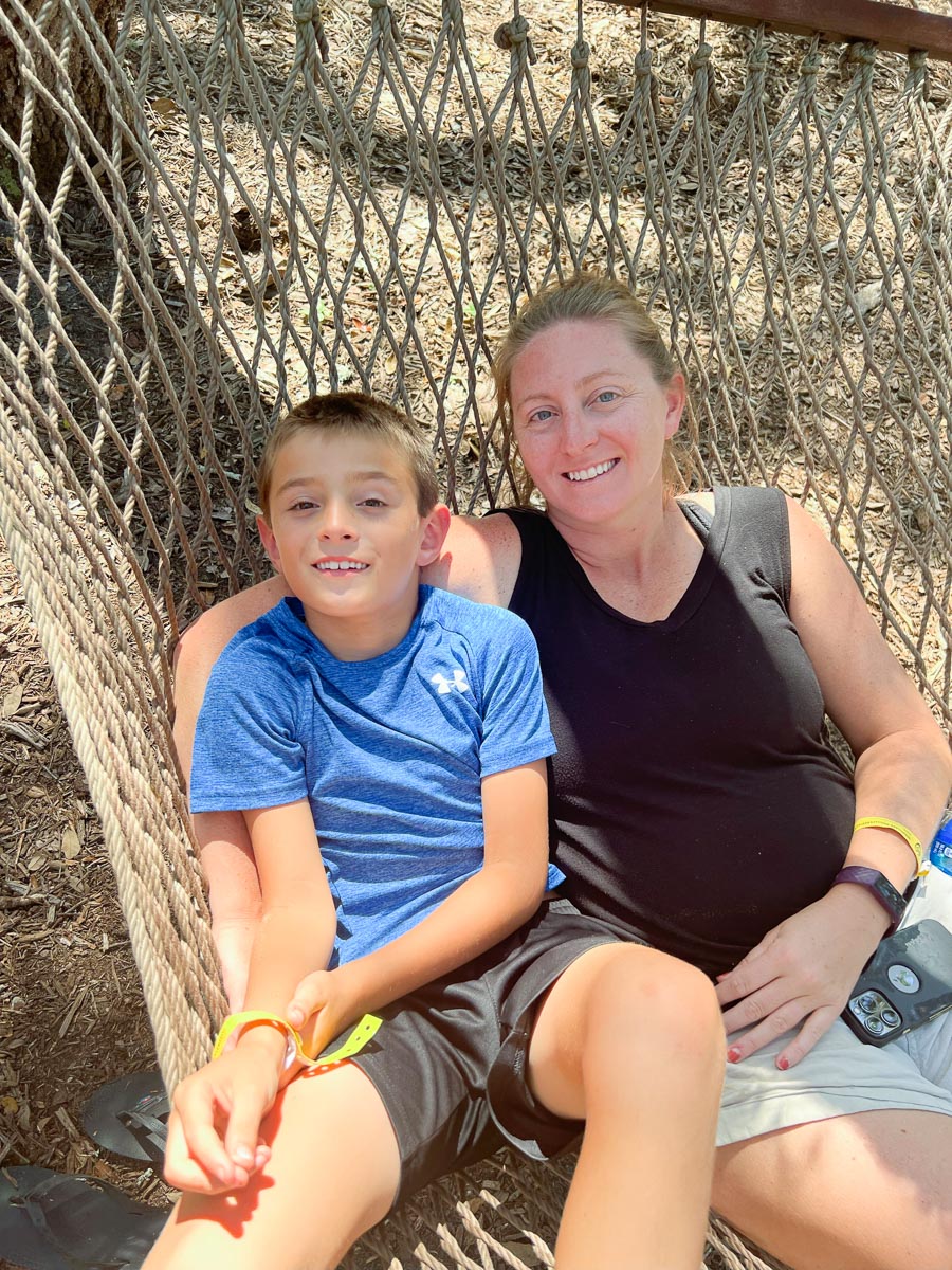 us sitting in a hammock at the glamping campsite