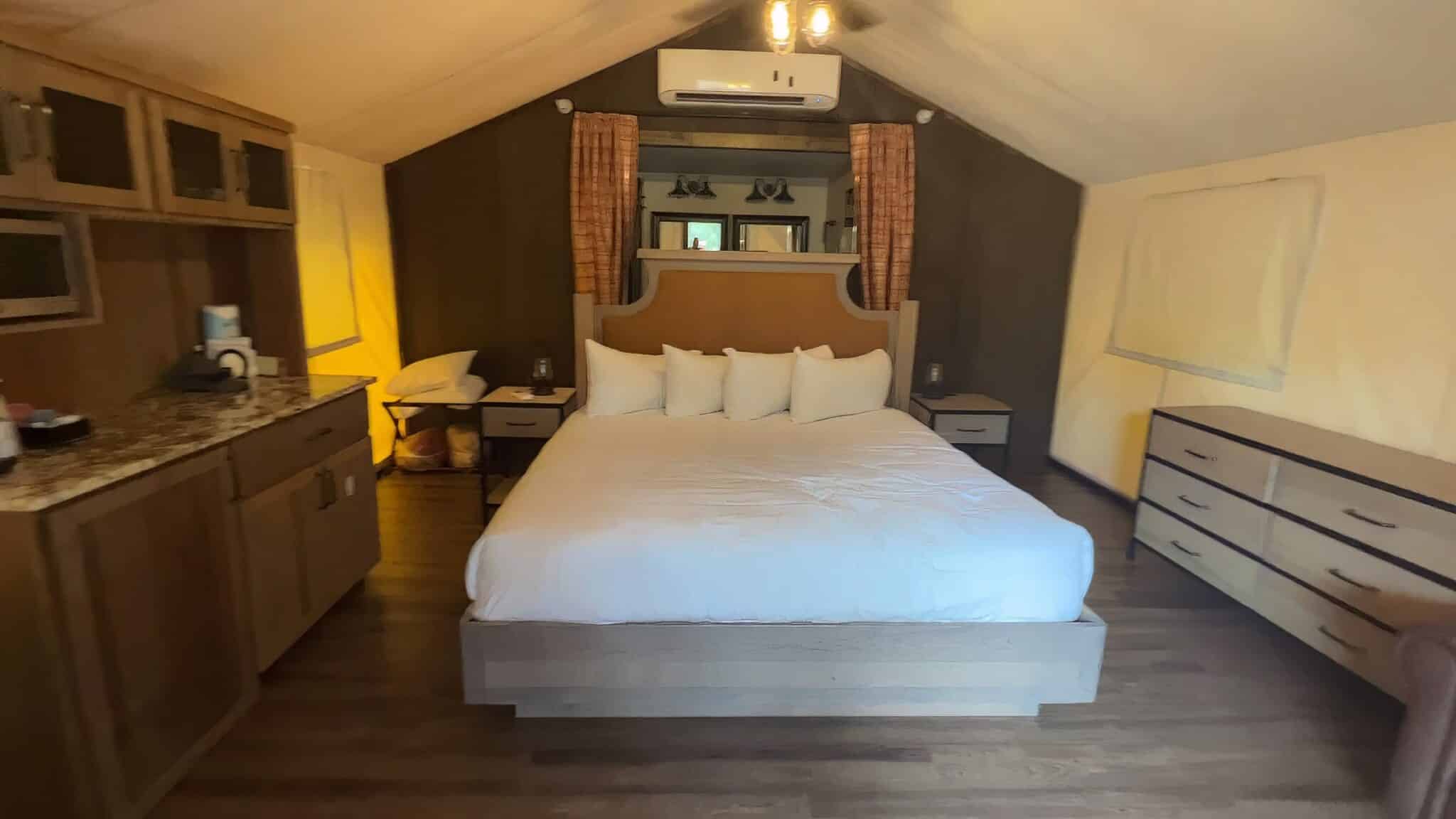 king bed inside the luxury glamping tent