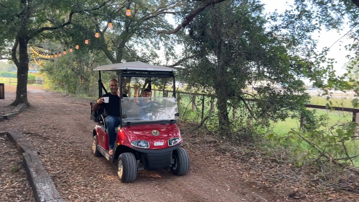 driving a golf cart at westgate river ranch