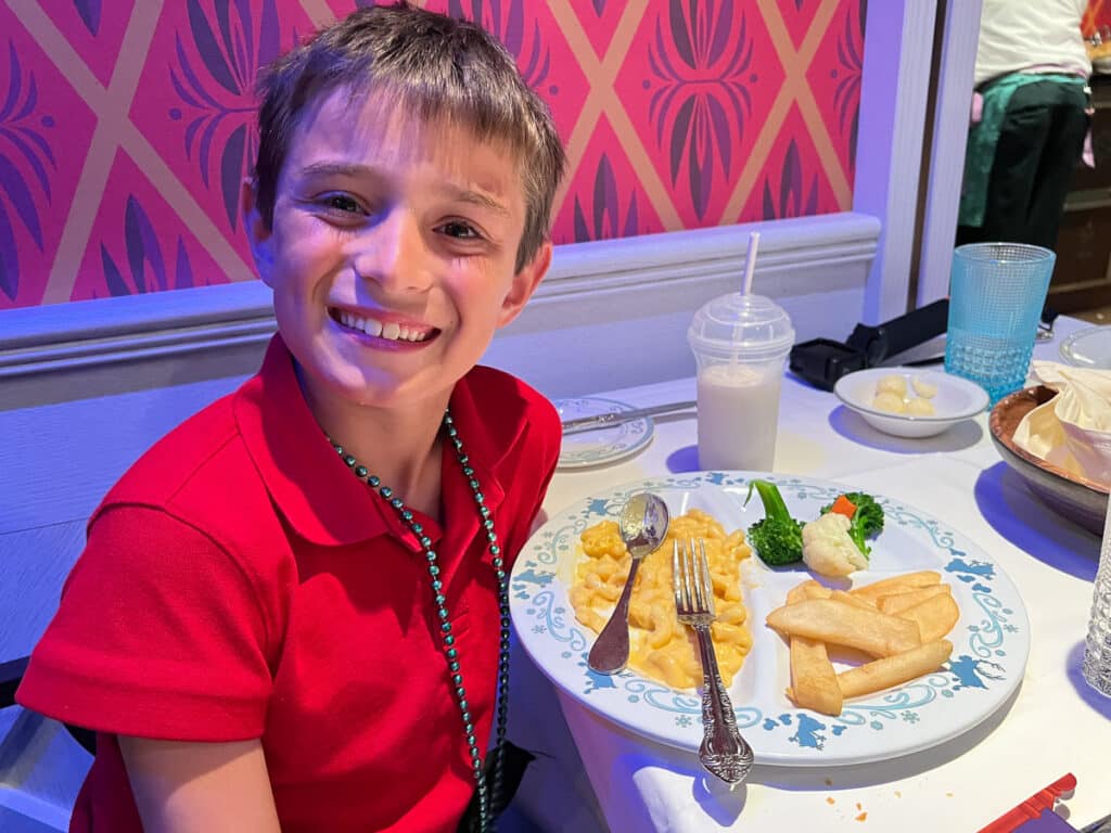 my son at Arendelle Restaurant on the Disney Wish