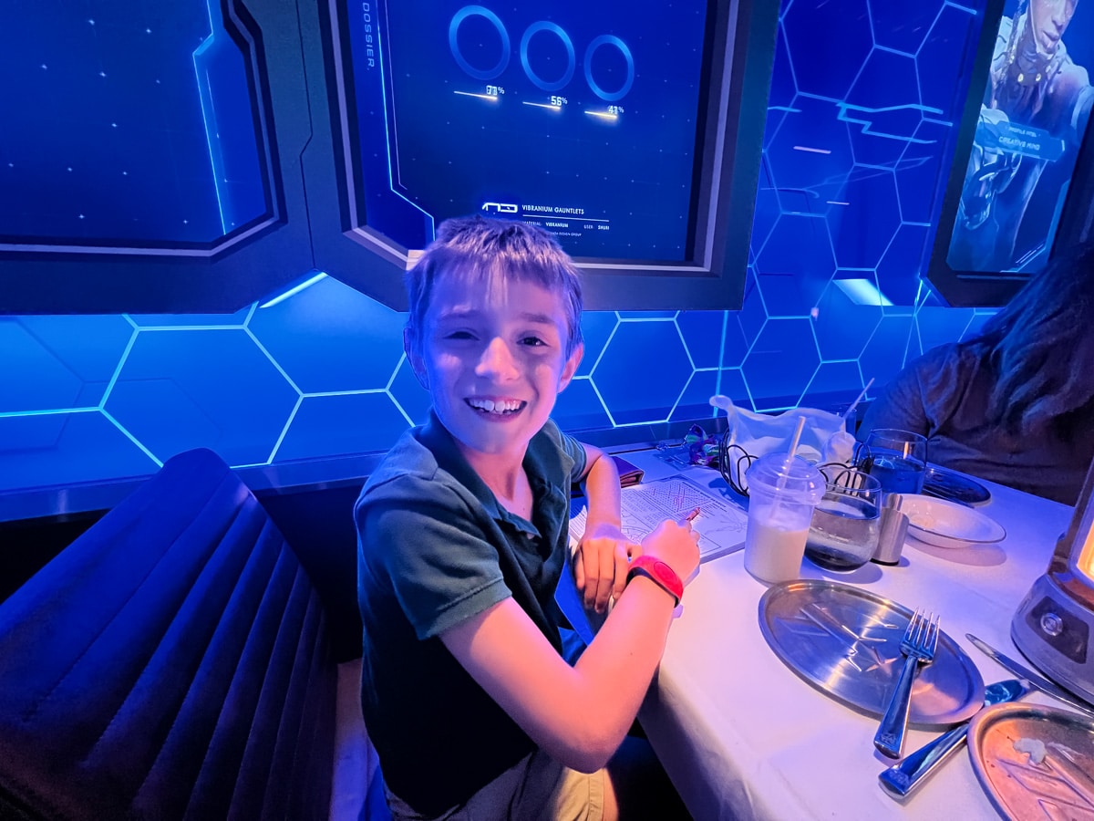 my son at the Marvel restaurant on Disney Wish