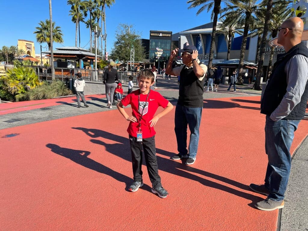 my son with his lanyard, ready for Universal Studios