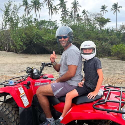 my husband and son on an ATV at Diamante Eco Adventure Park