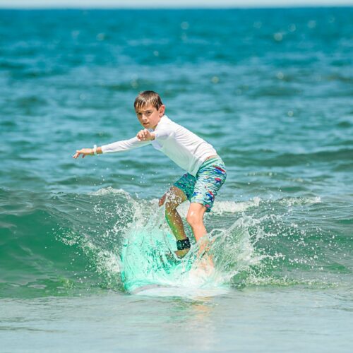 my son surfing in Tamarindo Costa Rica