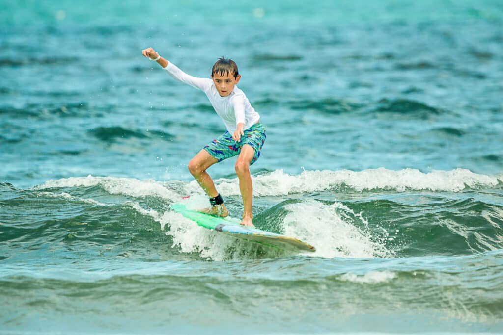 my son surfing in Tamarindo Costa Rica