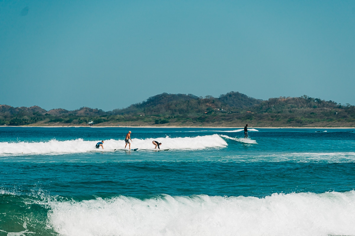 surfers in Tamarindo