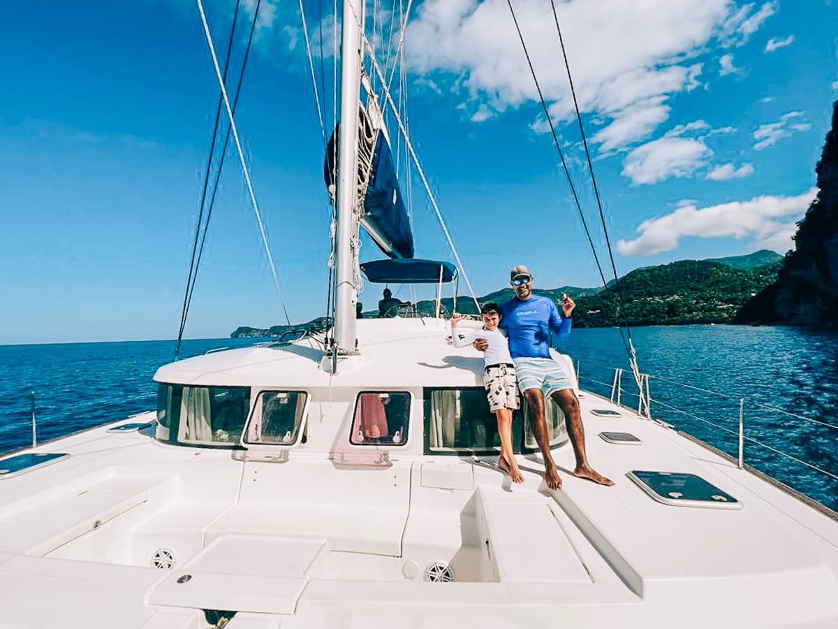 my husband and son on the catamaran tour