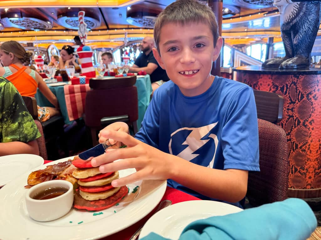 my son eating his meal at Dr Seuss breakfast