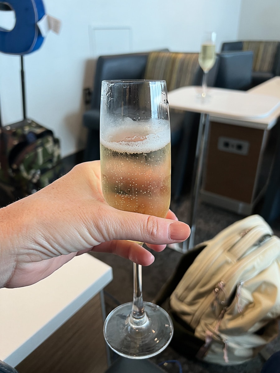 drinking champagne in the delta lounge
