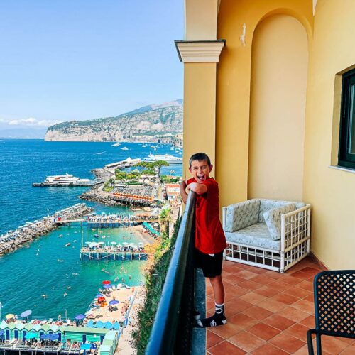 my son on the balcony of our junior suite