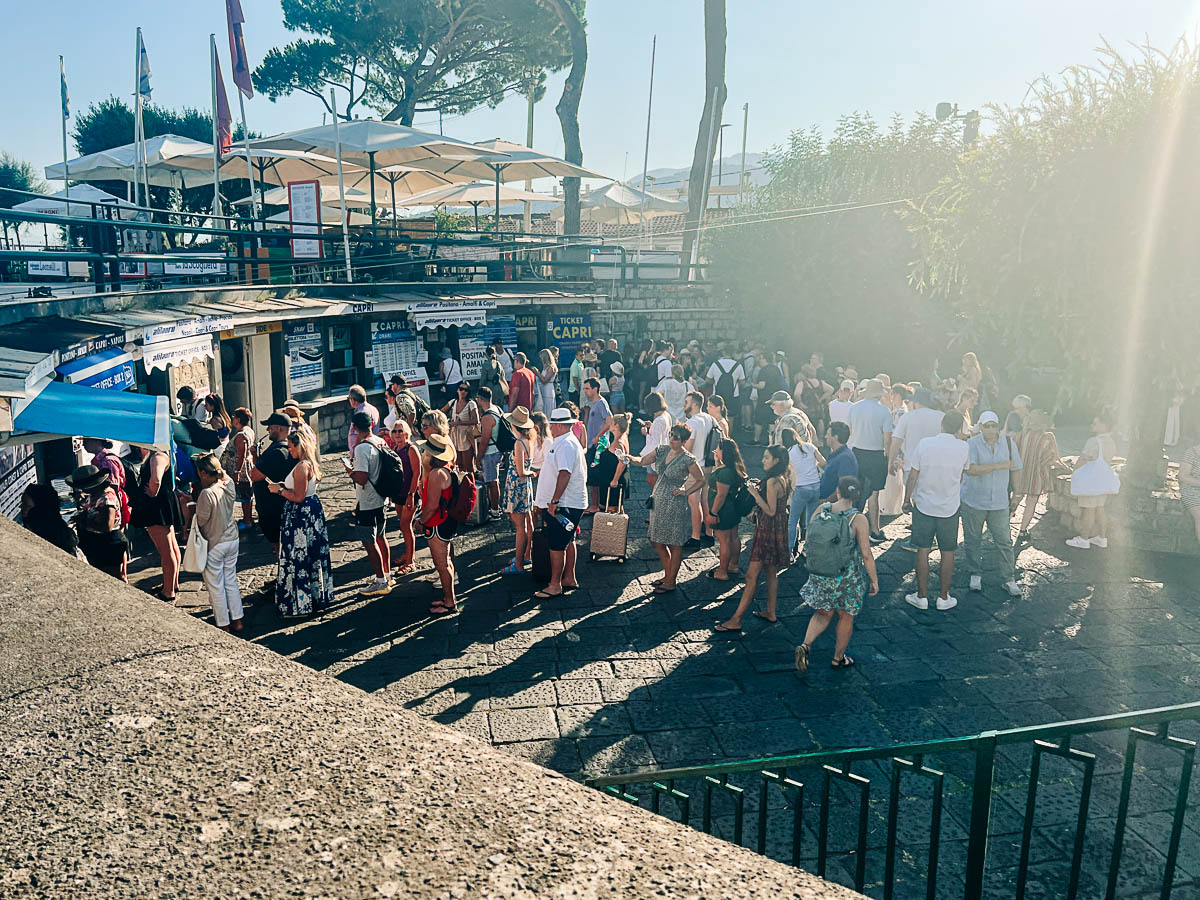 people in line for ferry tickets in Sorrento