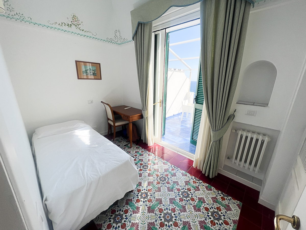 third bed in a separate bedroom at Hotel Luna Convento in Amalfi