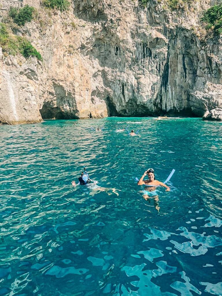 my husband and son in the water snorkeling