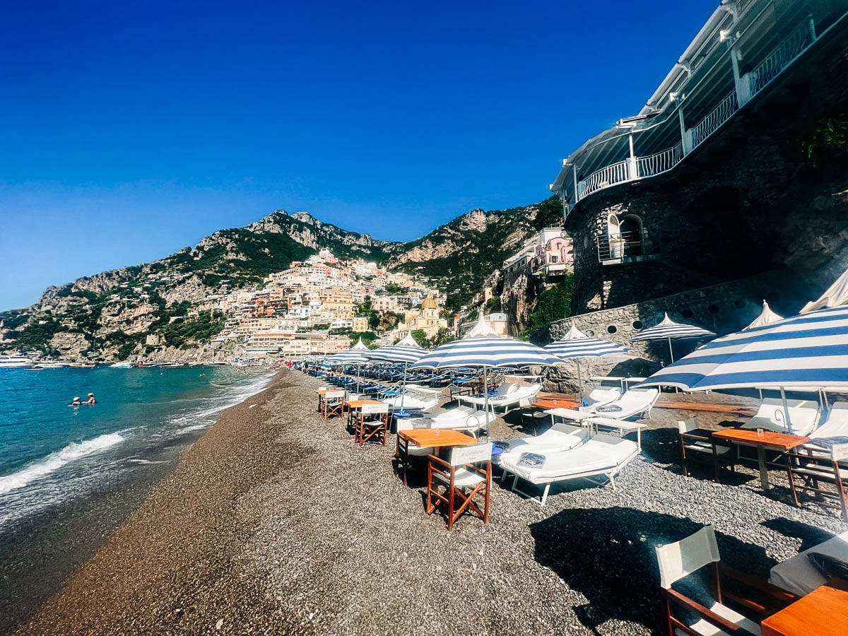 view of the chairs at La Scogliera Beach Club in Positano