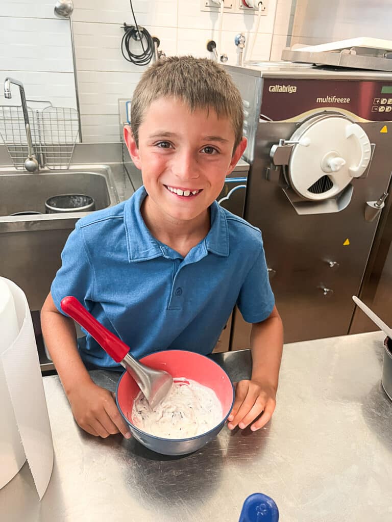 my son enjoying the ice cream he made