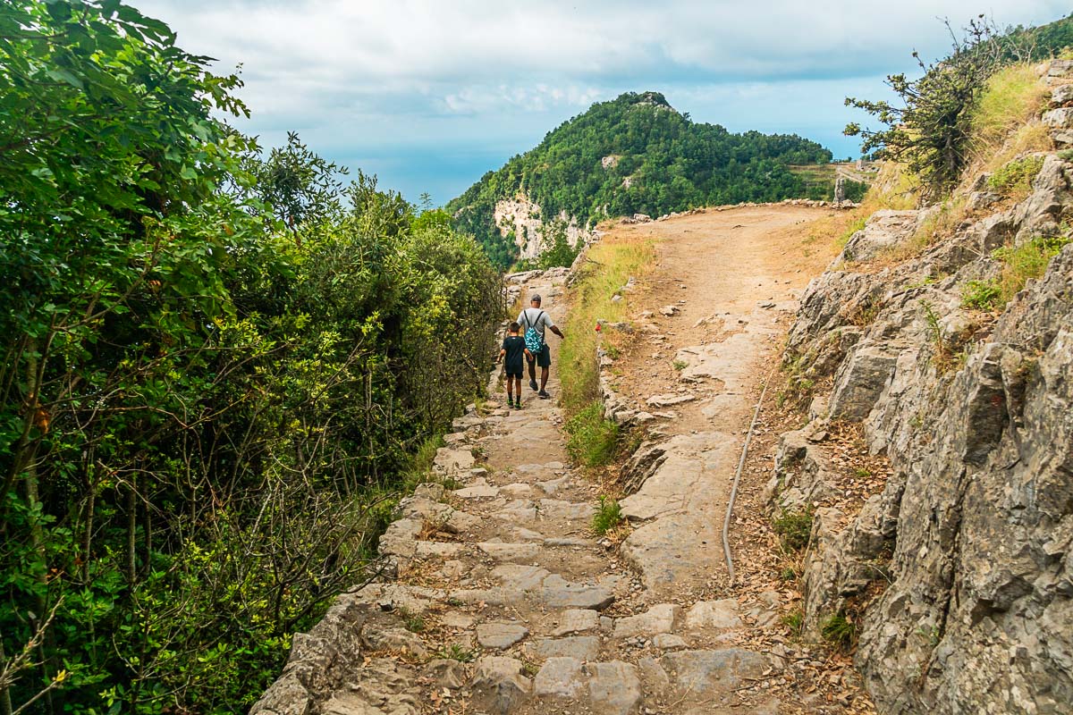 my husband and son hiking path of the gods