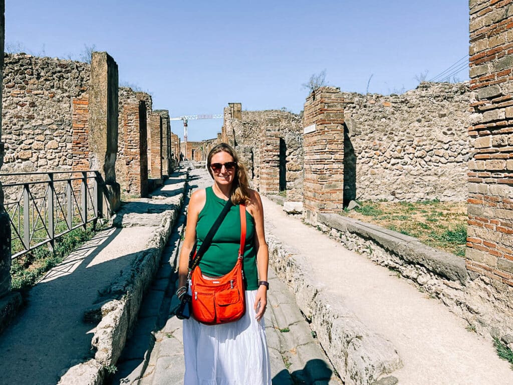 me walking on an old street in pompeii