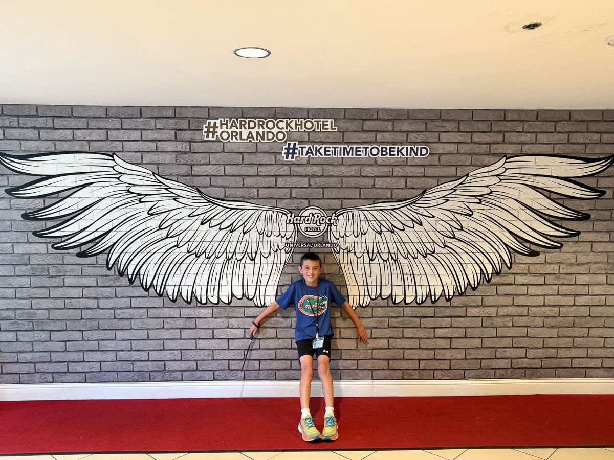 my son at the angel wings photo spot at Hard Rock Hotel