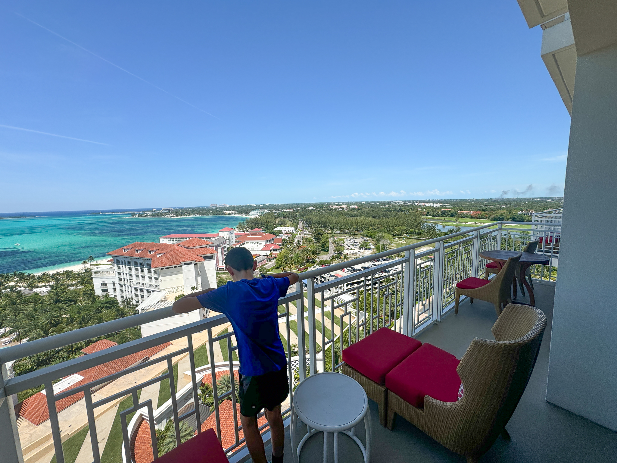 my son on the balcony of our suite at the Grand Hyatt Baha Mar